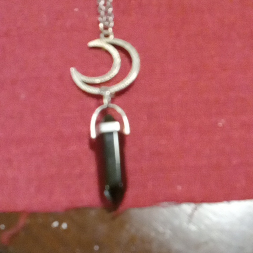 Crescent moon with protection stone